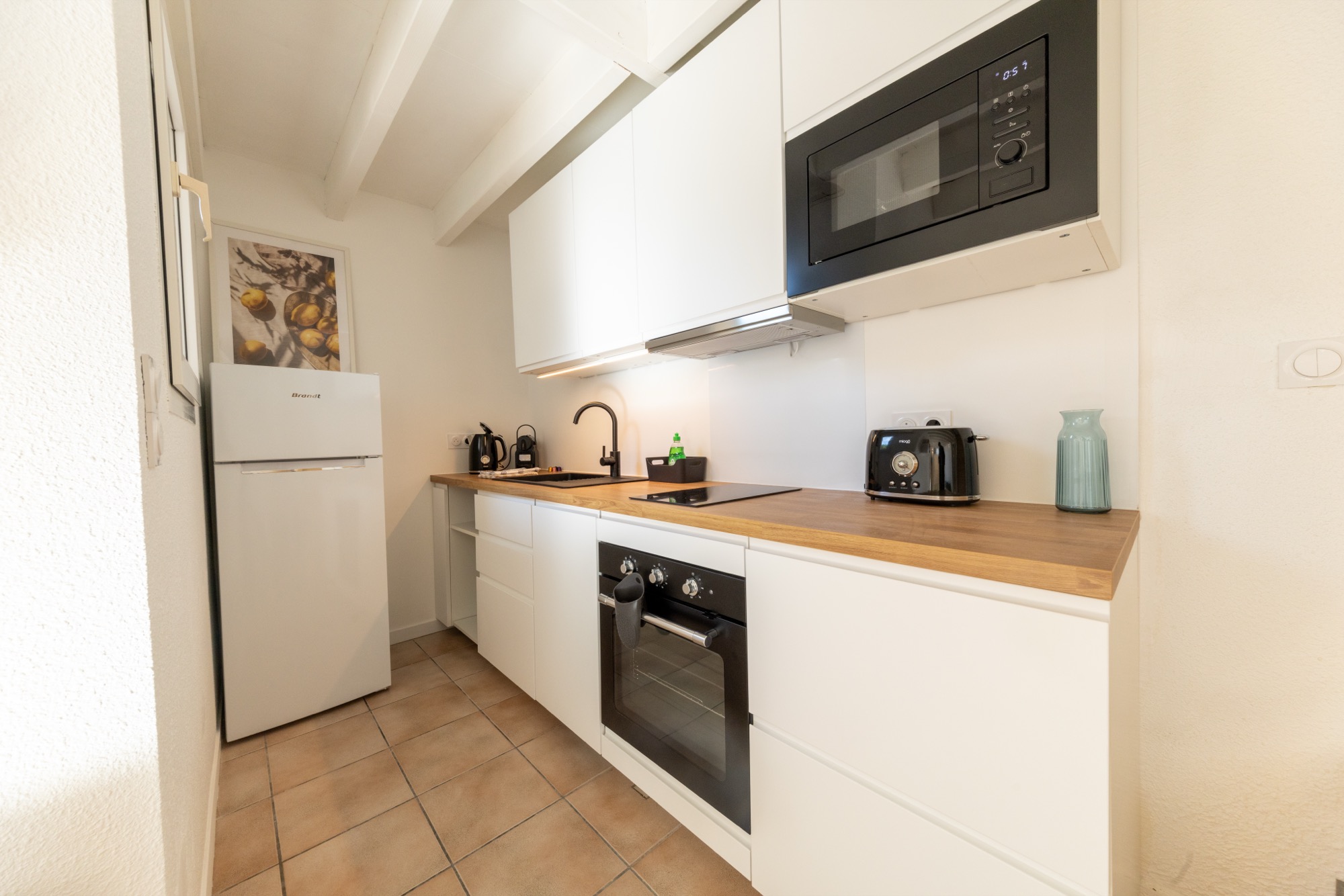 Terrasse avec vue du logement Les Mimosas